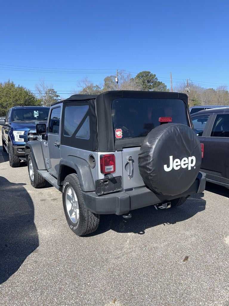 Used 2014 Jeep Wrangler Sport with VIN 1C4AJWAGXEL176432 for sale in Ozark, AL